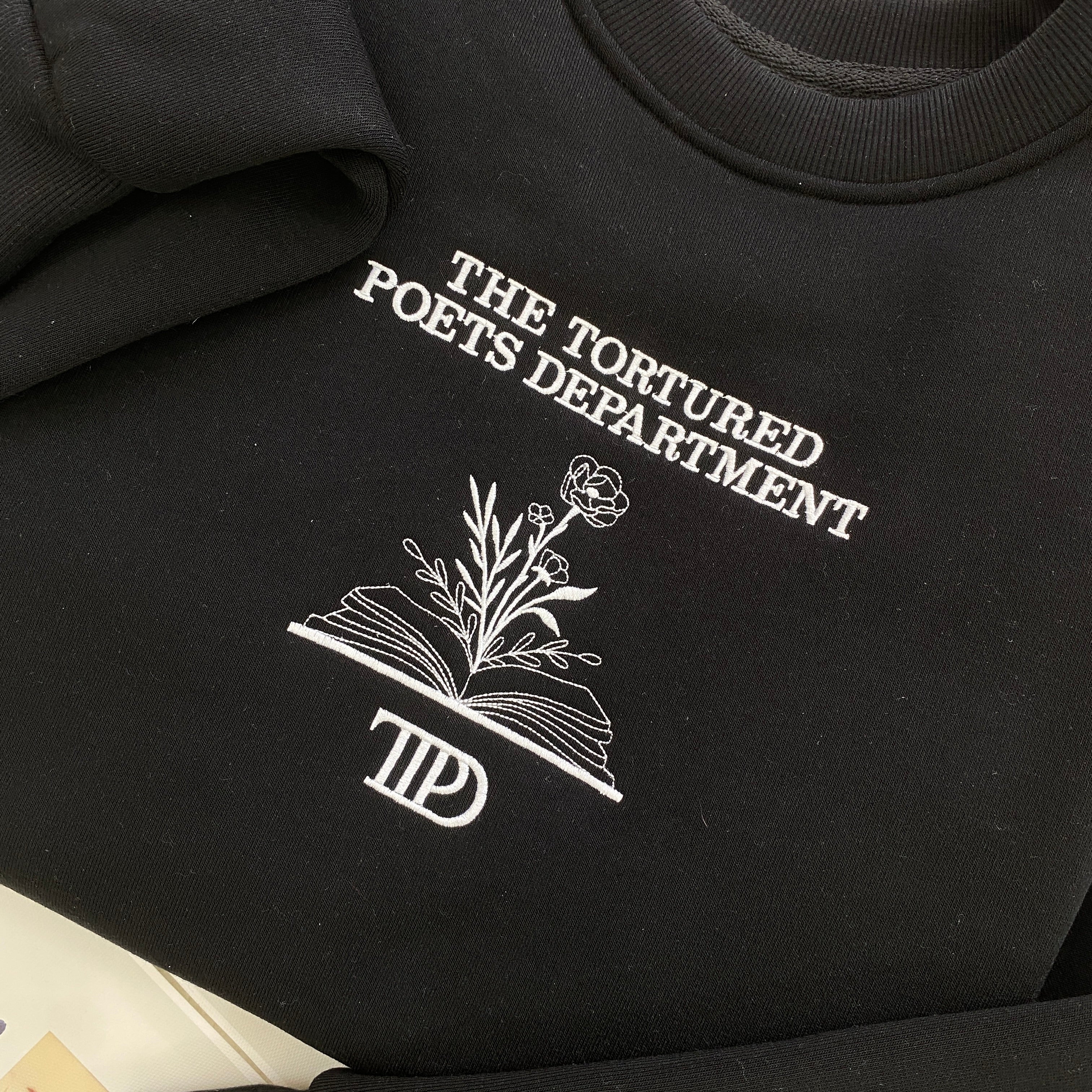 the tortured poet department book with flower new album embroidered shirt 1714379656869.jpg